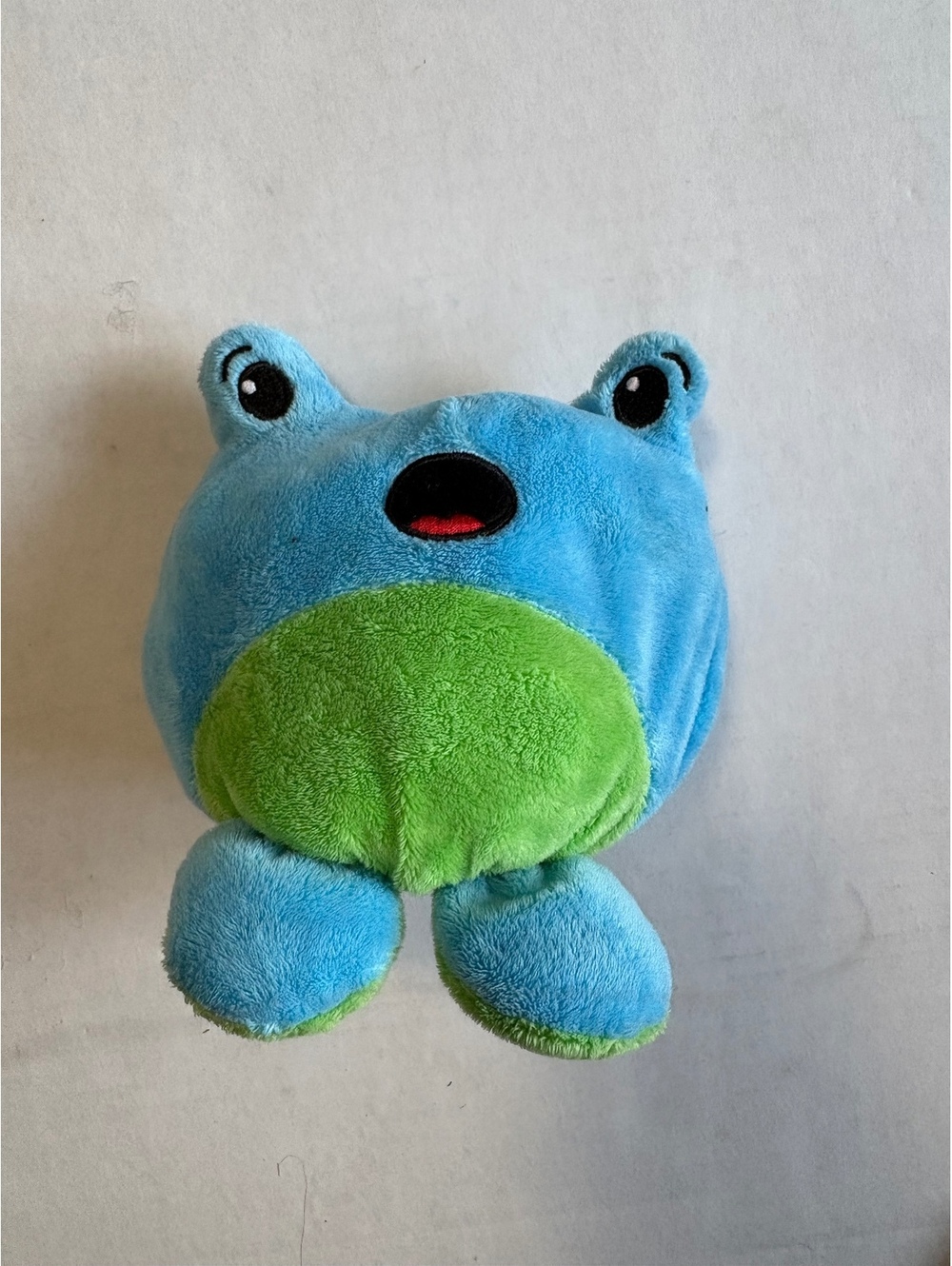 Blue and green frog stuffed animal